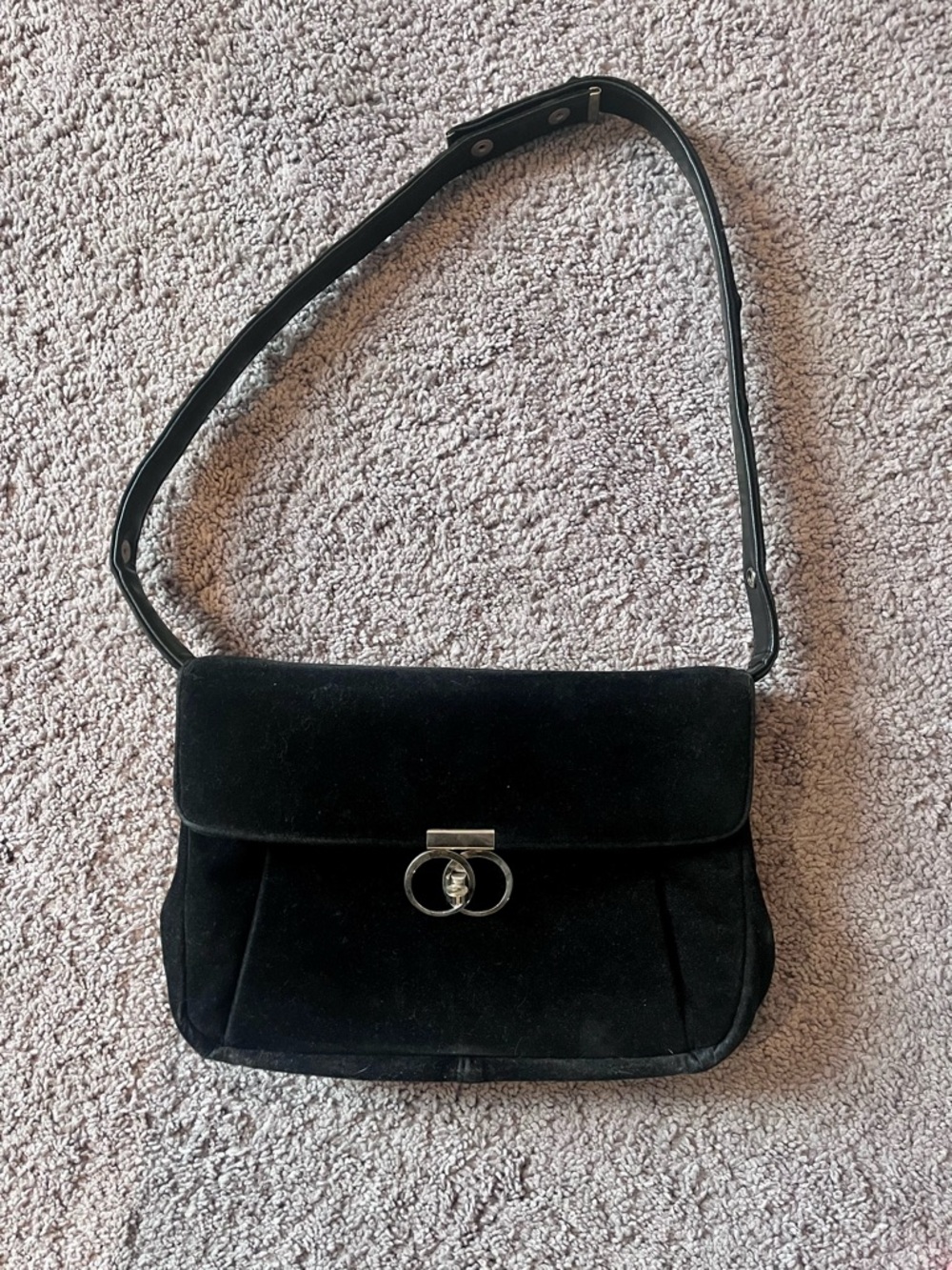 Vintage black velvet look handbag with adjustable strap and metal clasp
